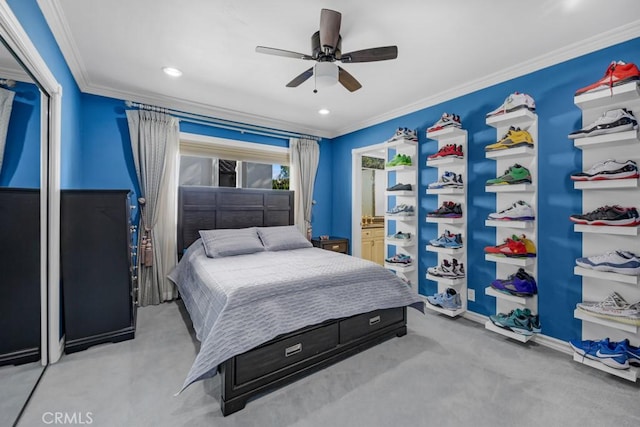 carpeted bedroom featuring recessed lighting, baseboards, ceiling fan, and crown molding