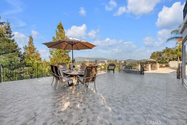 4440 Bergamo Dr, Encino, CA 91436 - view of patio / terrace featuring outdoor dining area and a mountain view