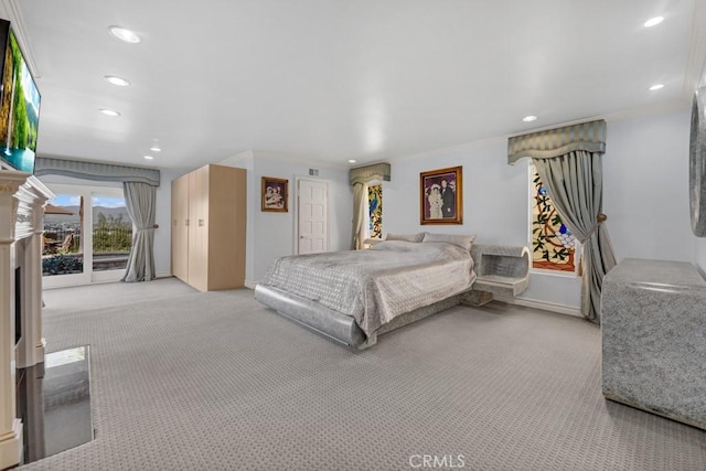 bedroom with baseboards, recessed lighting, light carpet, crown molding, and access to outside