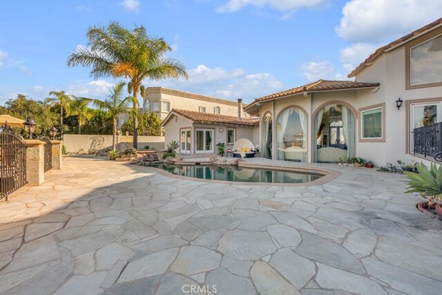 4440 Bergamo Dr, Encino, CA 91436 - view of swimming pool with fence, a patio, and a fenced in pool
