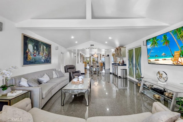 living room featuring recessed lighting and vaulted ceiling