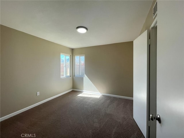 45541 Sancroft Ave, Lancaster, CA 93535 - carpeted empty room with baseboards