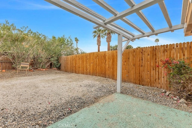 view of yard with a fenced backyard and a patio area