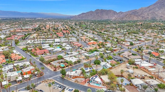 drone / aerial view featuring a mountain view and a residential view