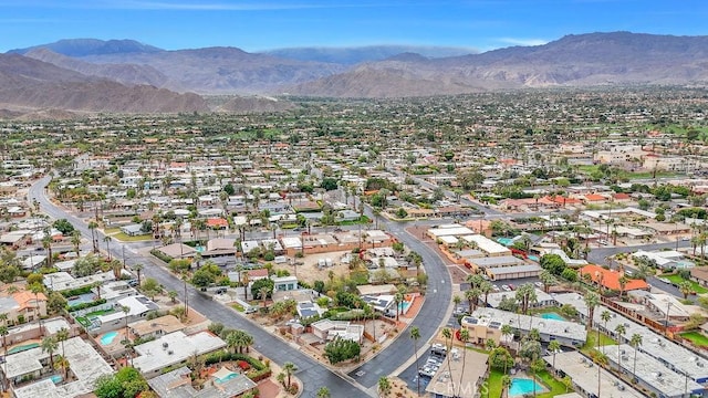 birds eye view of property featuring a mountain view and a residential view