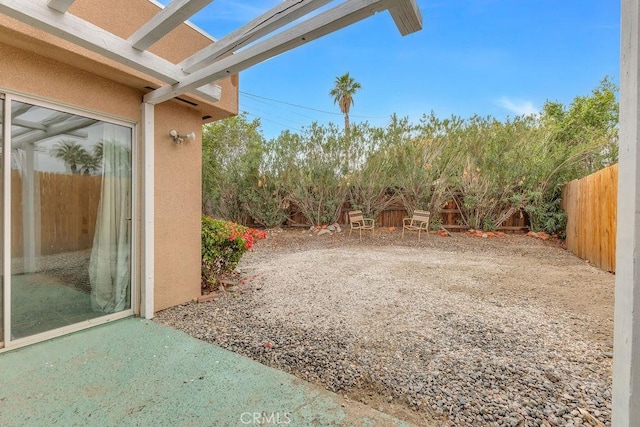 view of yard with a patio and a fenced backyard