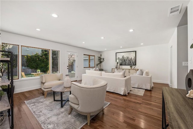 bedroom with visible vents, recessed lighting, baseboards, and hardwood / wood-style floors