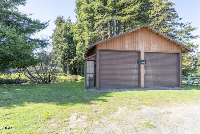 detached garage with fence