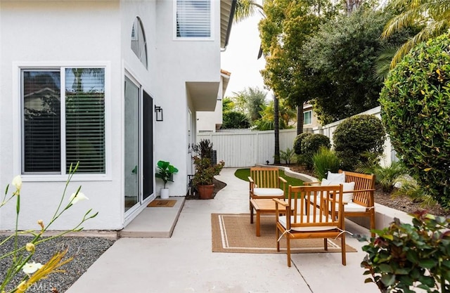 view of patio / terrace with fence