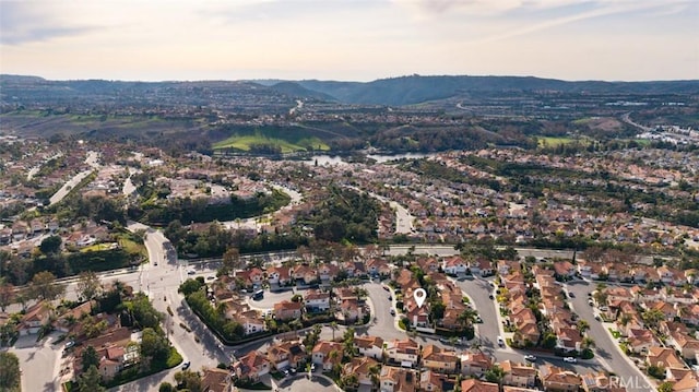 drone / aerial view with a mountain view and a residential view