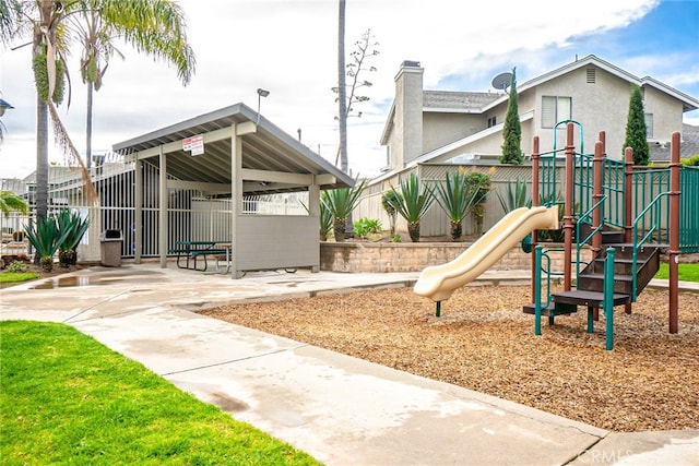 community jungle gym with fence