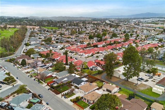 birds eye view of property featuring a mountain view and a residential view