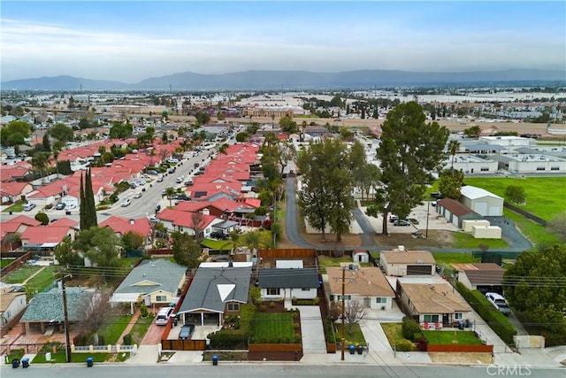 bird's eye view featuring a mountain view and a residential view