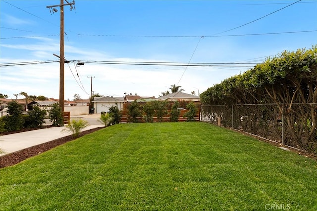 view of yard with fence