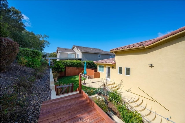 view of yard featuring a patio area and fence