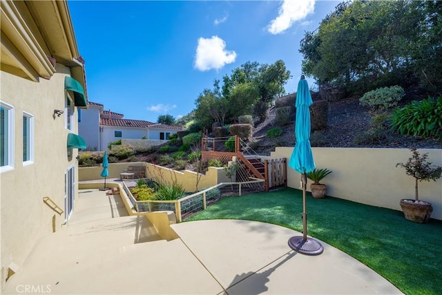 view of patio / terrace with fence