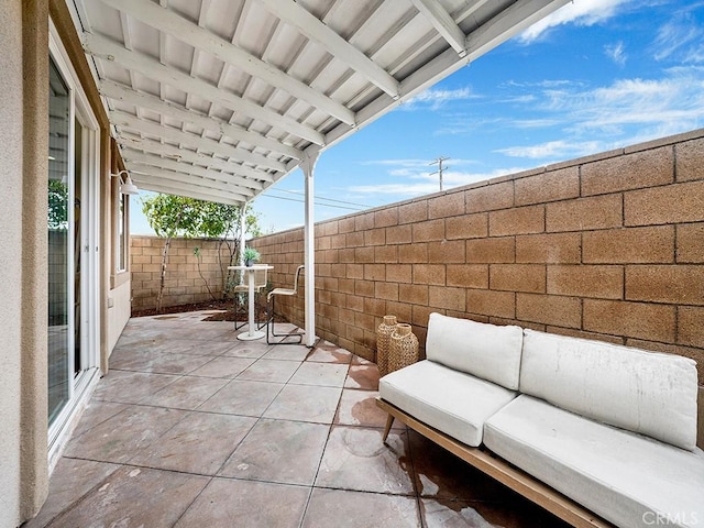 view of patio featuring an outdoor hangout area and a fenced backyard