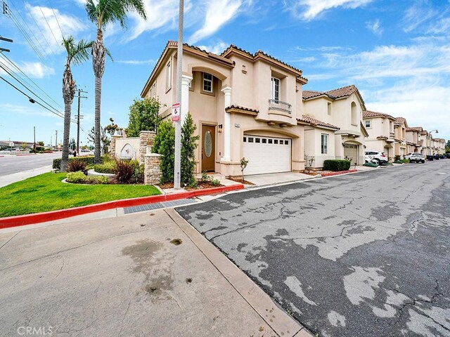 exterior space with curbs and a residential view