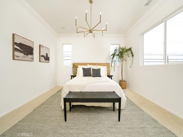 carpeted bedroom with visible vents, an inviting chandelier, crown molding, and baseboards