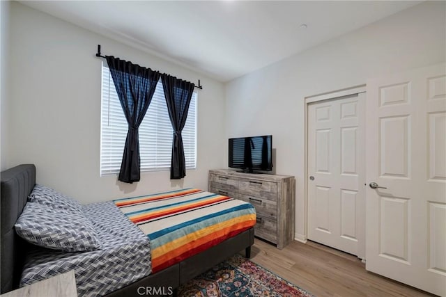 bedroom with light wood-style flooring