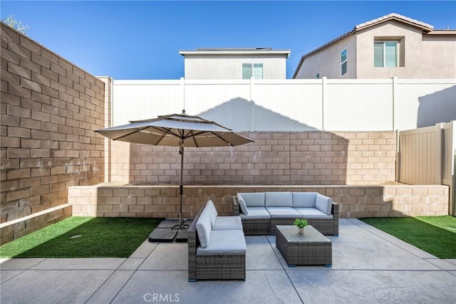 view of patio featuring outdoor lounge area and a fenced backyard