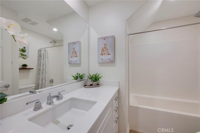 full bathroom with visible vents, toilet, shower / bath combo, recessed lighting, and vanity