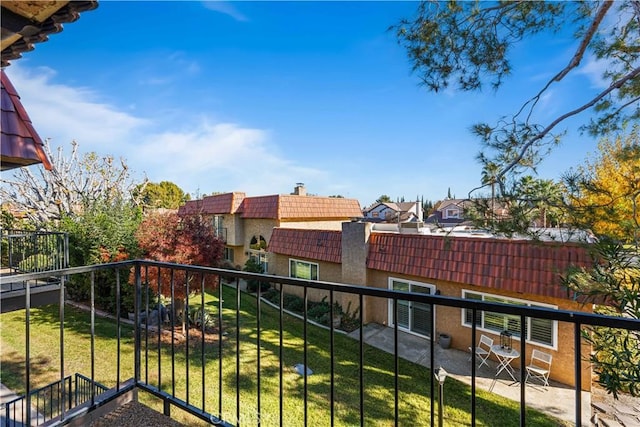 balcony featuring a residential view