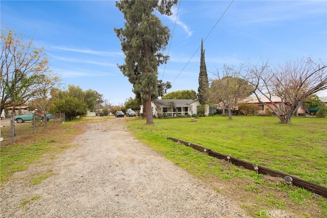 view of road with driveway