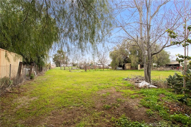 view of yard with fence