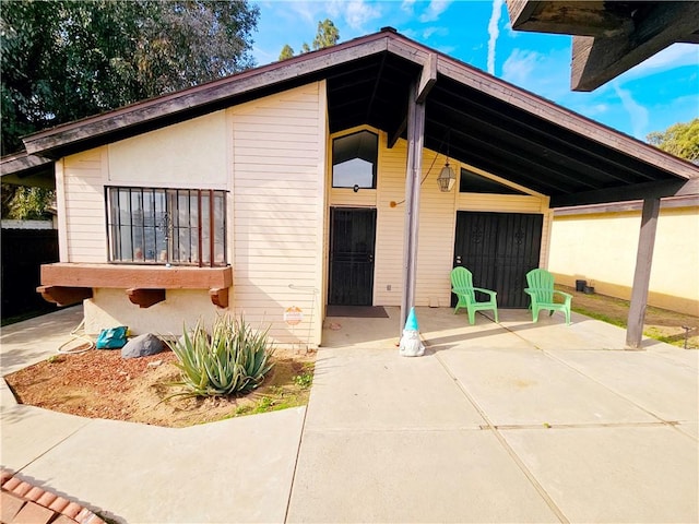 view of front facade with a patio area