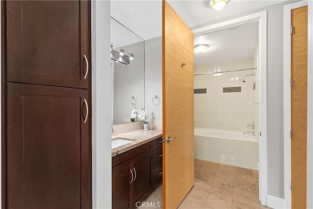 395 E 4th Unit 25, Long Beach, CA 90802 - full bath with vanity, tiled shower / bath combo, and tile patterned floors