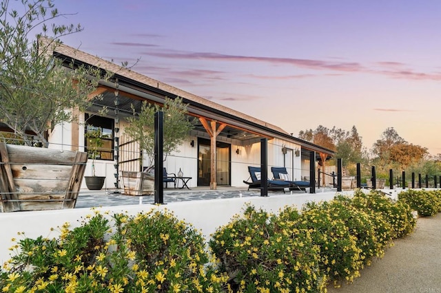 35715 Calle Nopal, Temecula, CA 92592 - back of property at dusk with a patio