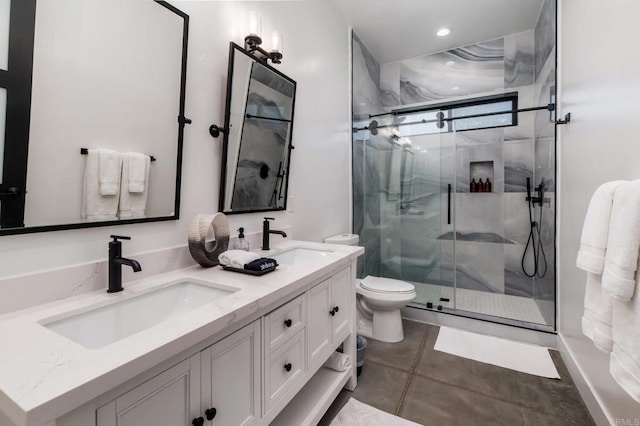 35715 Calle Nopal, Temecula, CA 92592 - bathroom featuring double vanity, a marble finish shower, and recessed lighting