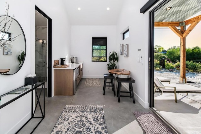 35715 Calle Nopal, Temecula, CA 92592 - hallway with finished concrete floors, recessed lighting, and vaulted ceiling