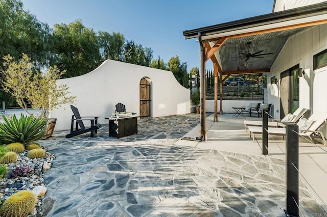 35715 Calle Nopal, Temecula, CA 92592 - view of patio / terrace with a ceiling fan and an outdoor fire pit