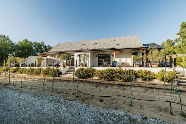 35715 Calle Nopal, Temecula, CA 92592 - rear view of house with a patio and board and batten siding