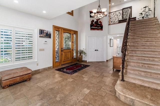 35715 Calle Nopal, Temecula, CA 92592 - foyer entrance featuring stone tile flooring, a chandelier, stairway, a high ceiling, and recessed lighting