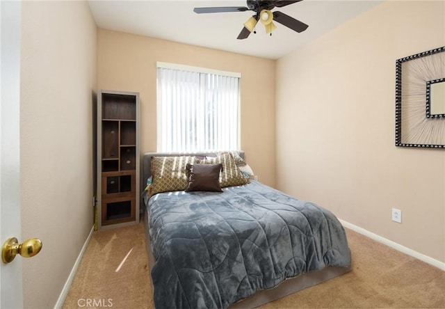 bedroom with baseboards, carpet, and ceiling fan