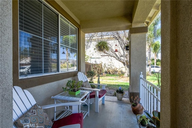 view of patio featuring a porch