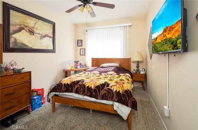 carpeted bedroom featuring a ceiling fan