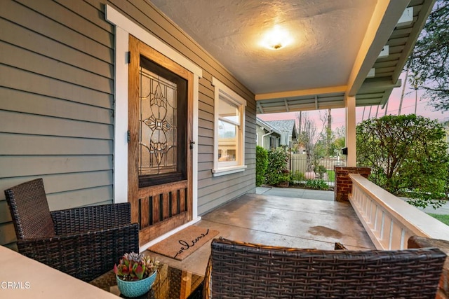 view of patio featuring a porch