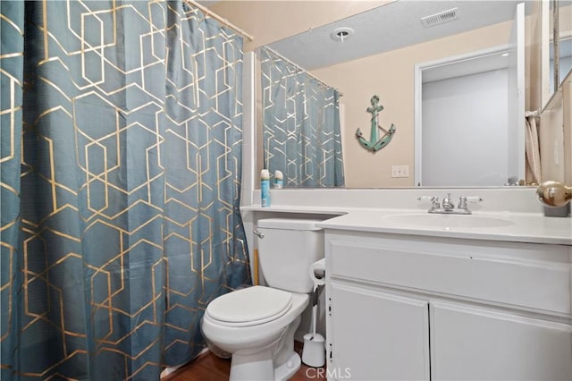 full bathroom with visible vents, toilet, vanity, and a shower with curtain