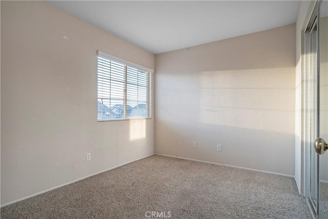 view of carpeted spare room