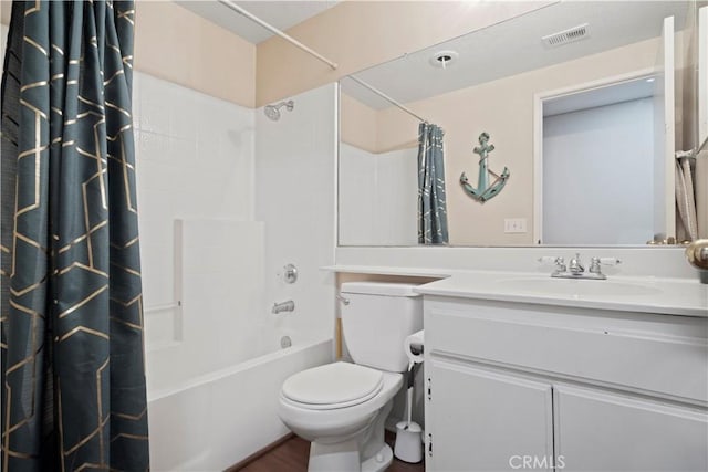 full bath featuring vanity, toilet, visible vents, and shower / tub combo with curtain