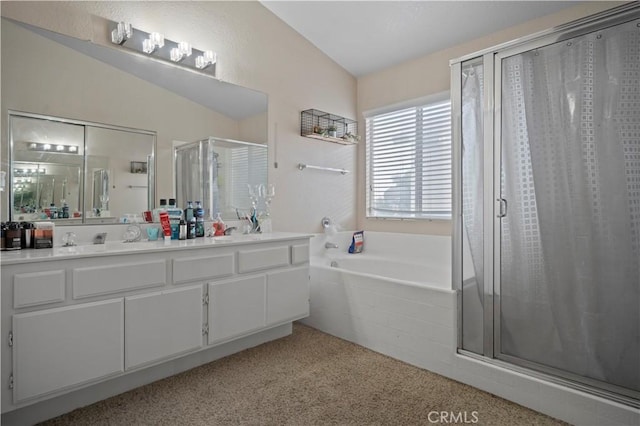 full bath featuring a garden tub, a stall shower, carpet flooring, lofted ceiling, and vanity