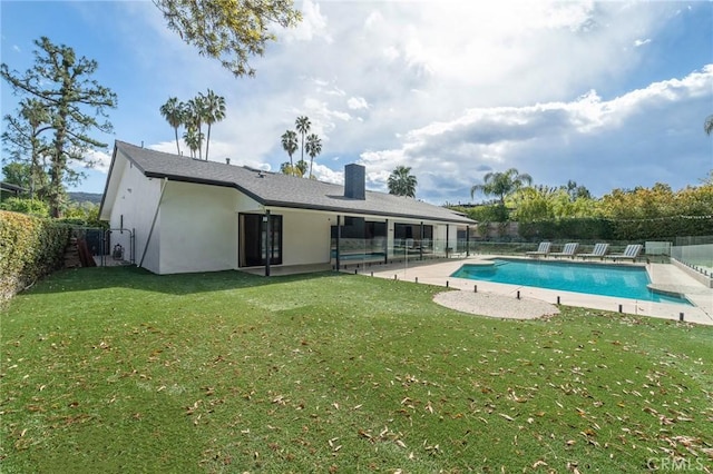 view of pool featuring a fenced backyard, a fenced in pool, a patio, and a yard