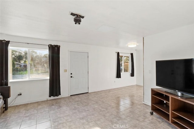 living area featuring light tile patterned floors