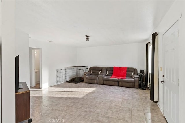 living room featuring light tile patterned floors