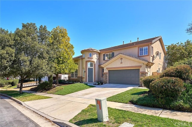 mediterranean / spanish home with stucco siding, stone siding, concrete driveway, a front yard, and a garage