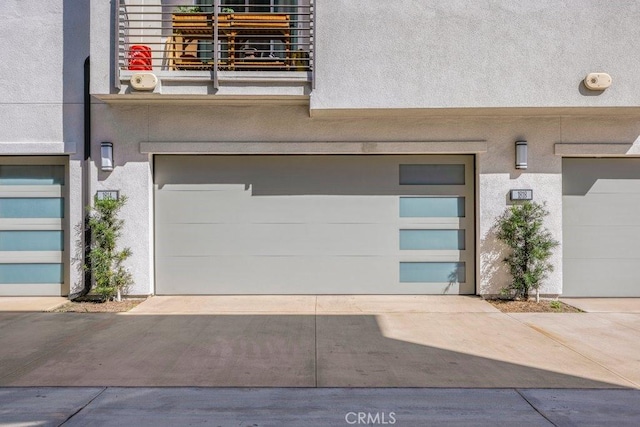 garage featuring driveway